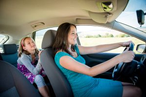 What happens to you if you are not wearing a seat belt during a collision?